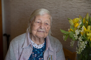 Portrait of elderly woman. Age 90 years. Closeup view.