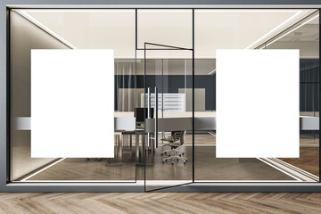 Luxury coworking office interior with two blank poster on glass wall