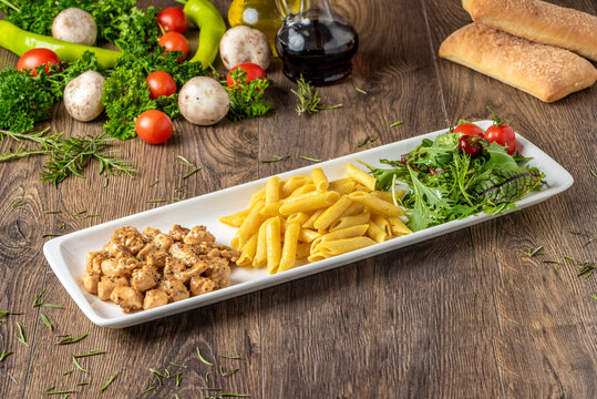 Grilled Cubed Chicken With Pasta And Salad