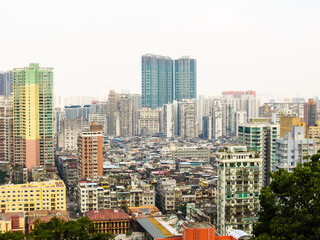 Fototapeta na wymiar View of Macau city from the height of Guia Fortress