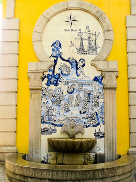 Old Small Fountain In The Center Of Macau, Decorated With Portuguese Azulejo Tiles