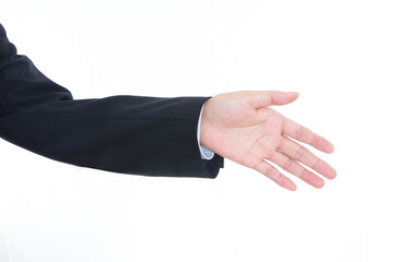 The gesture of reaching out for a handshake in front of a white background