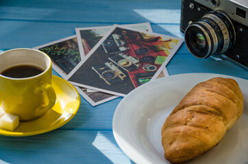 still life of cake with cup of coffee highlighted by sunlight