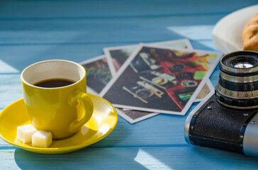still life of cake with cup of coffee highlighted by sunlight
