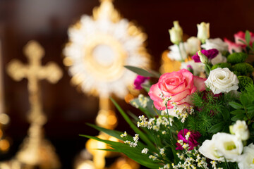 Catholic religion concept. Catholic symbols composition: The Cross, monstrance and golden chalice.