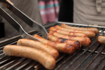 Close up of bratwurst sausage on grill