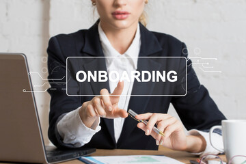 Businessman presses button onboarding process business on virtual panel. - 384730709
