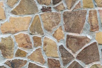 Old castle stone wall texture background. A stone wall as a background or texture.