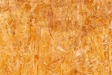 OSB plywood or oriented strand board, wood wall background texture