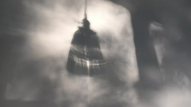 Abstract Wall with Moving Shadows and Lampshade