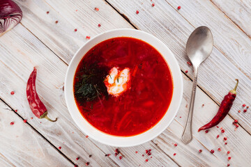 Russian beetroot soup borsch with sour cream