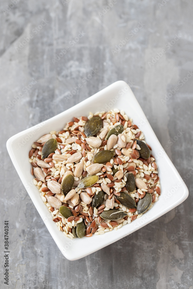 Sticker assorted seeds in the small white bowl