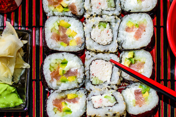 Making at home Japanese-style hand-rolled sushi