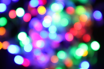 black abstract background of defocused bokeh colorful blurred beautiful shiny illuminate