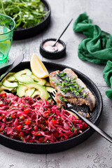 Vinaigrette salad and canned herring, selective focus