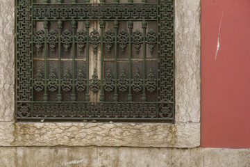 cast iron grill in a street of the Bairro Alto district in Lisbon, Portugal