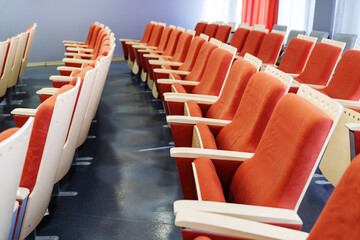 Fototapeta premium Empty seats in the hall for business meetings. Cancellation of conferences due to economic crisis
