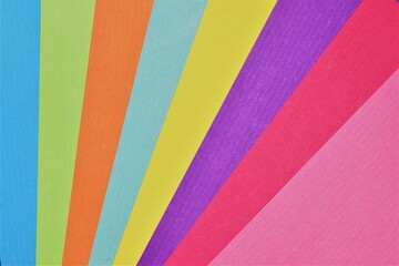 Multicolored background with sheets of kraft paper