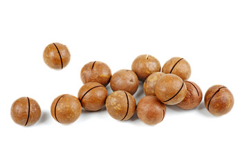 Unshelled macadamia nuts on white background