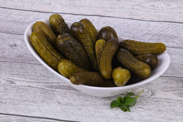Pickled cucumbers heap in the bowl