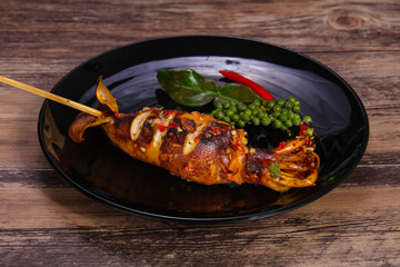 Grilled squid with sauce and hebs