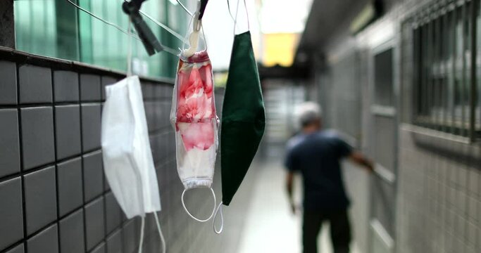 Face masks hanging outside drying