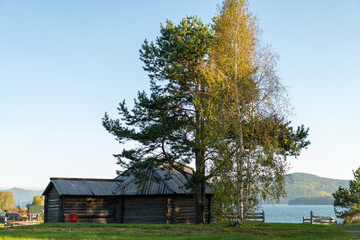 Fototapeta na wymiar Natural landscape with wooden buildings.