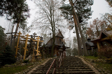 wooden church and crosses on Grabarka mountain in poland on an autumn day