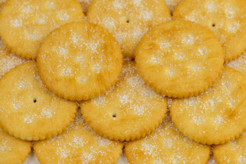 Fototapeta na wymiar Pile of round cracker with sweet sugar on top pattern