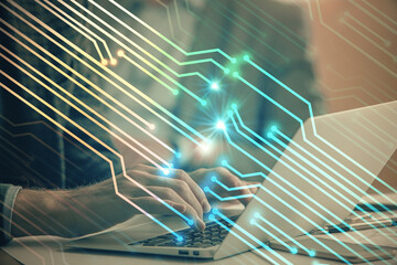 Businessman with computer background with technology theme hologram. Concept of big data. Double exposure.