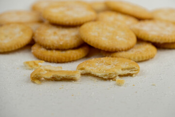 Pile of round cracker with sweet sugar isolated on white background