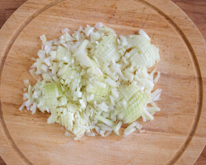 Finely chopped onions on a cutting board