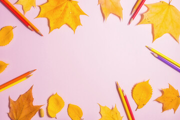Fototapeta premium back to school theme with autumn leaves and stationery