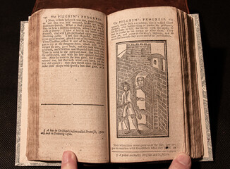 Bunyan's famous allegorical work 'Pilgrim's Progress' first printed in 1678. This edition printed around 100 years later with primitive woodcuts. 