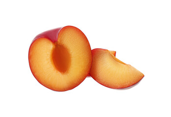 Cut fresh ripe plum isolated on white