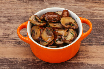 Roasted champignon with herbs and spices