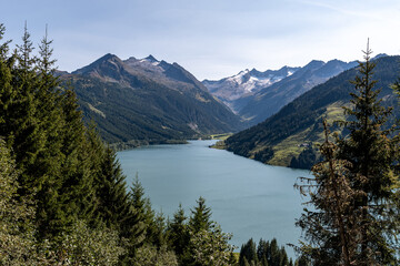 Fototapeta na wymiar Durchlassboden lake with mountains Mannlkarkopf in province Salzburg near Gerlos and Konigsleiten, Austria