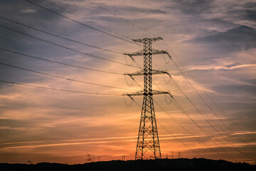 High voltage pole with electric cables, industry