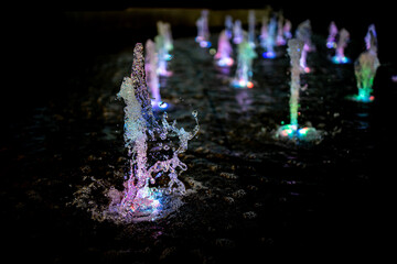  fountain with colorfully lit in the evening