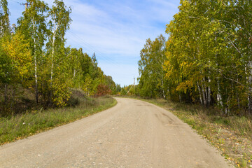 Fototapeta na wymiar country road in autumn