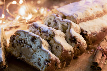 Sliced Christmas Stollen. Traditional German Christmas cake with dried fruit