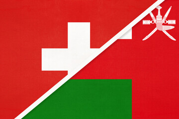 Switzerland and Sultanate of Oman, symbol of national flags from textile. Championship between two countries.