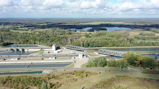 Aerial view of the fly-by of the large lock system with storage basin and lock basin at the Mittellandkanal near Wolfsburg, Germany