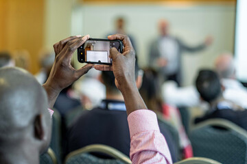 Filming A Business Conference Event With A Smartphone