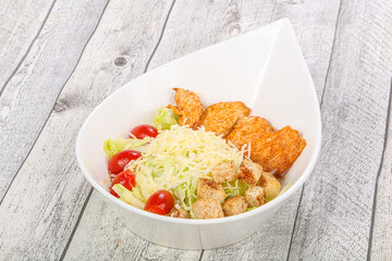 Caesar salad with chicken and parmesan