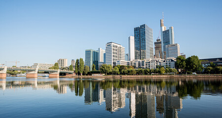 Fototapeta premium Frankfurt Skyline at Dawn with Reflection in the River Main