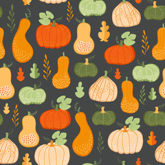 Seamless pattern with colorful leaves and pumpkins	
