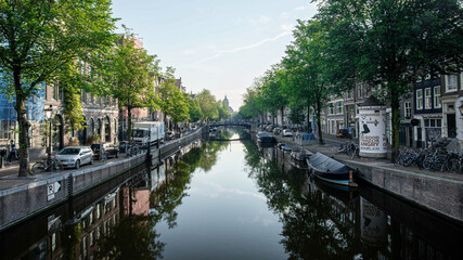 Fototapeta na wymiar City of Amsterdam Reflections in a Canal