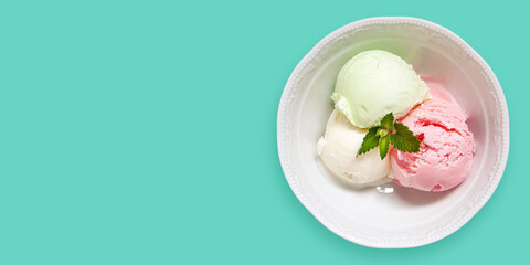 ice cream in a bowl on color background. Top view