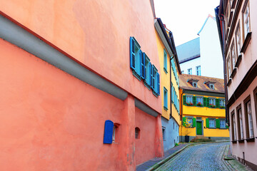 Walking on narrow street in the autumn . Old european town with with comfortable street . View of...